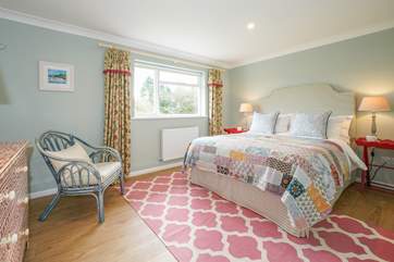 The main bedroom has its own quirky style setting a cosy mood as soon as you walk in.