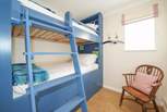 The bunk bedroom is perfect for the younger ones to enjoy. 
