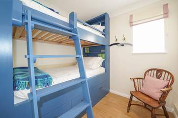 The bunk bedroom is perfect for the younger ones to enjoy.