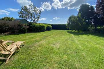 The enclosed garden overlooks views of the countryside.