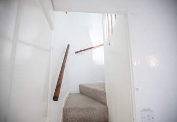 Please mind your head as you ascend and descend the stairs which are steep but benefit from a handrail. 