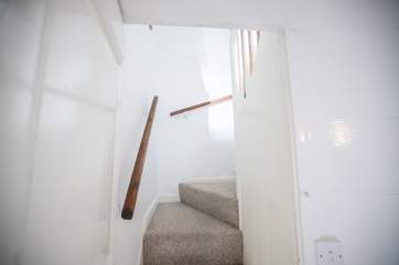 Please mind your head as you ascend and descend the stairs which are steep but benefit from a handrail.