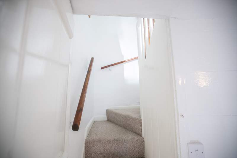 Please mind your head as you ascend and descend the stairs which are steep but benefit from a handrail. 