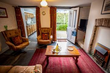 The sitting-room is comfortable and cosy for those colder months.