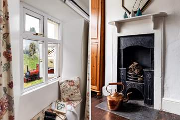 The main bedroom has an original fire (now ornamental) and overlooks the platform at the back of the house.