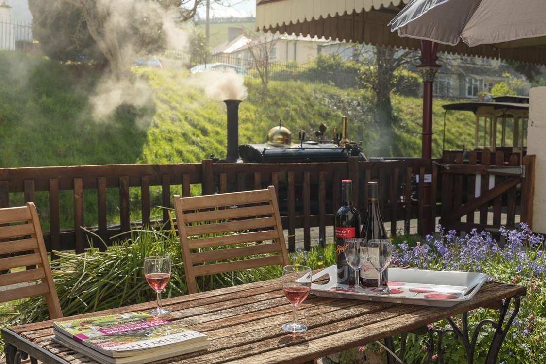 Enjoy a drink on your private patio area next to the railway.