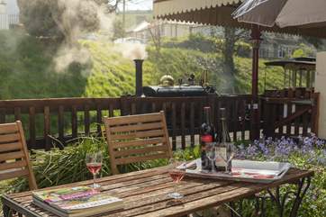 Enjoy a drink on your private patio area next to the railway.