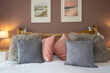 The sumptuous super-king sized bed will guarantee a good night's sleep.