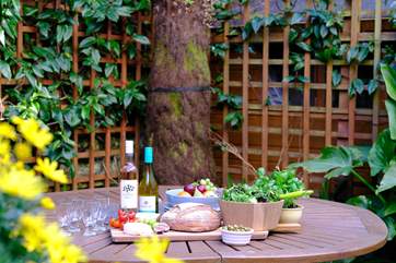 The secluded patio area is perfect any time of day.