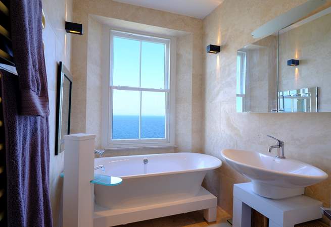 The family bathroom on the first floor offers a bath with a view!