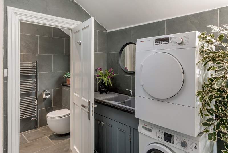 The separate utility-room has the added bonus of a washer and drier.