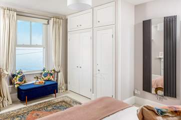 This dreamy bedroom has fabulous views.