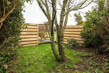This is the garden area leading off the patio-area at the front of the cottage (a shed will be installed shortly to complete the fence line. This will be available for guests' use and to store bikes and surf boards).