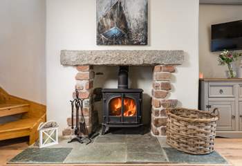 The toasty wood burner will keep everyone warm on the chillier nights. 