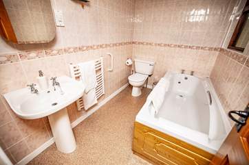 You step up to the downstairs bathroom (please be careful with the heated towel rail).