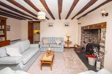 The sitting-room sits to the back of the house, with views and a back door out to the garden. The crowning glory has to be the wonderful log-burner that will keep everyone toasty.
