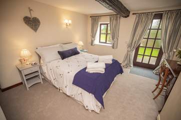 The downstairs double has access to the garden. Please note the ground floor has a few steps up and down.