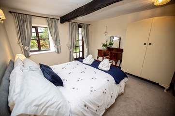 The downstairs double bedroom offers a ground floor option with a bathroom also on this level. Please note the door gives you access to the back garden.