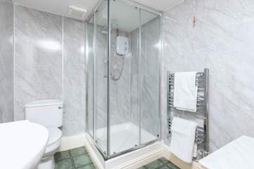 The shower-room between the two first floor bedrooms. Please be careful with the heated towel rail