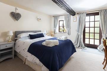 The downstairs double bedroom offers a ground floor option with a bathroom also on this level. Please note the door gives you access to the back garden.