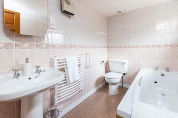 You step up to the downstairs bathroom (please be careful with the heated towel rail).