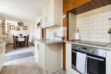 The kitchen/dining-room offers the perfect setting to start and finish a day.