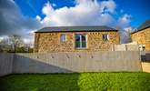 The neighbouring barn sits to the side of The Dairy's garden, but their garden is on the other side of the barn (you can see in the picture). - Thumbnail Image