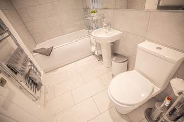 The family bathroom has the joy of under-floor heating.