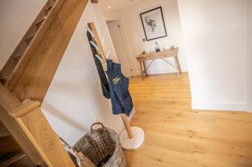 The main entrance hall links all the ground floor bedrooms and family bathroom. The entire ground floor benefits from under-floor heating.