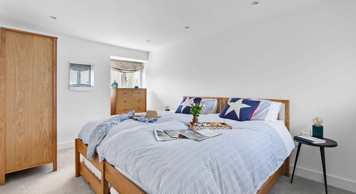 The dual-aspect twin bedroom offers the perfect room to unwind after a day at the beach.  Although not 'zip and link' beds the extra deep mattresses allow for the beds to be pushed together if required. 