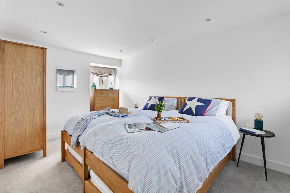 The dual-aspect twin bedroom offers the perfect room to unwind after a day at the beach.  Although not 'zip and link' beds the extra deep mattresses allow for the beds to be pushed together if required.