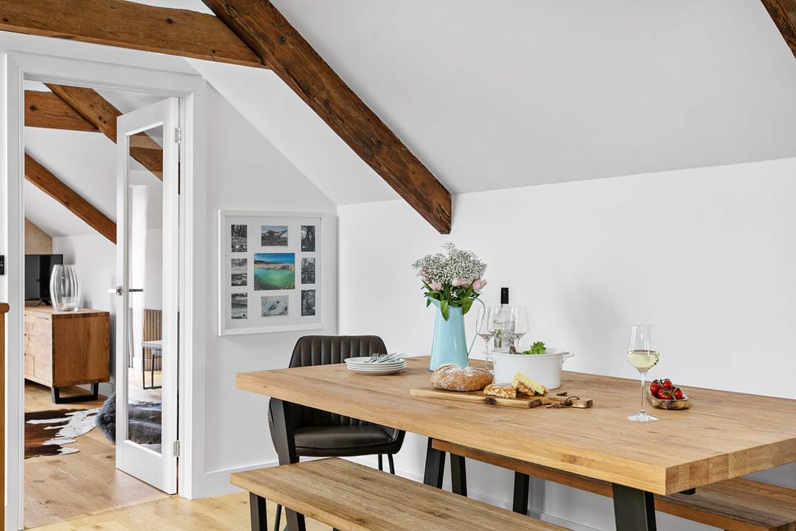 Enjoy late lunches and early suppers at the wonderful dining-table.