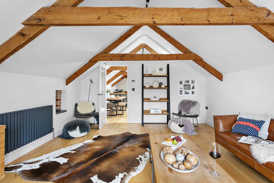 The sitting-room is modern and contemporary, offering a room for chatting, relaxing or TV viewing.