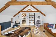 The sitting-room is modern and contemporary, offering a room for chatting, relaxing or TV viewing.