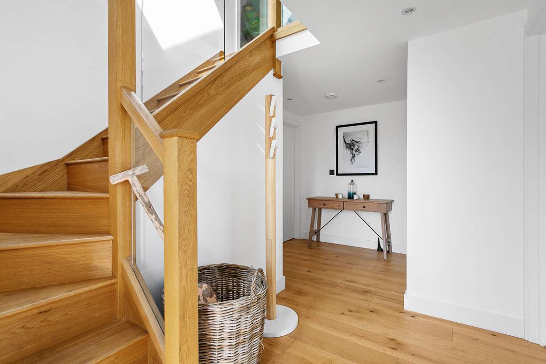 The main entrance hall links all the ground floor bedrooms and family bathroom. The entire ground floor benefits from under-floor heating.