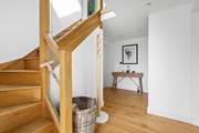 The main entrance hall links all the ground floor bedrooms and family bathroom. The entire ground floor benefits from under-floor heating.