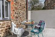 Enjoy a spot of al fresco dining in the sun.