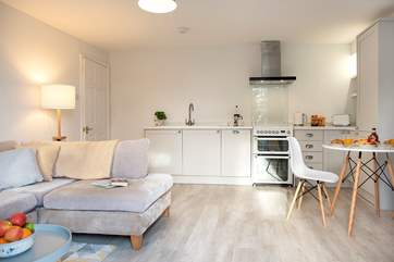 The open plan living-room is cosy and inviting.