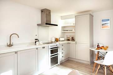 The gorgeous kitchen is fully equipped, should you fancy cooking rather than eating out.