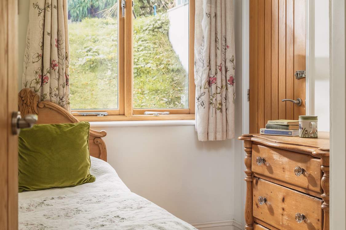 Pretty bedroom 2 overlooks the garden.