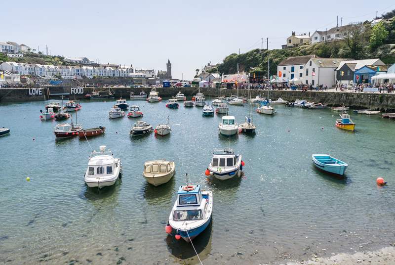 Porthleven harbour, here you will find boutique shops,  delicious restaurants and cafes.  