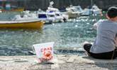 The whole family will love crabbing on Porthleven harbour.  - Thumbnail Image