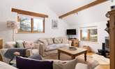 Curl up on the cosy sofas. - Thumbnail Image