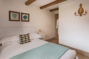Bedroom three is light and airy.
