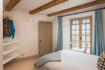 Pretty bedroom 3 has a double bed. The door leads into the utility-room.