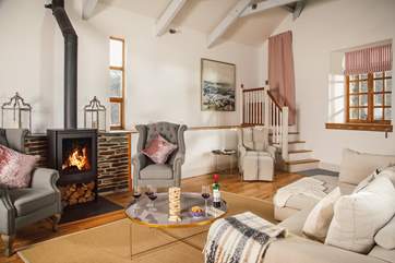 Wrap up warm and enjoy a bracing walk along one of the many coast paths before you head back and rustle up a hearty supper in the well-equipped kitchen before relaxing on the super-comfy sofa in front of the toasty wood-burner.