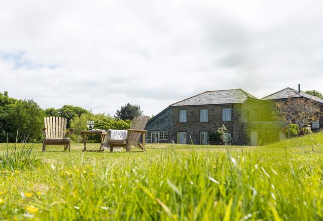 Relax on the lawned area in front of gorgeous Carthew Barn - bring your book and a beverage....