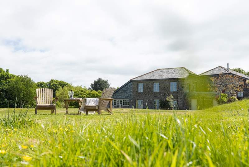 Relax on the lawned area in front of gorgeous Carthew Barn - bring your book and a beverage....