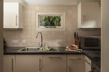 The galley kitchen has everything you need to rustle up a rather delicious supper.