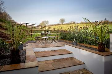 Your raised patio area has beautiful views over the rolling Devon countryside.